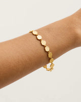 WOVEN LIGHT COIN BRACELET in Gold from By Charlotte