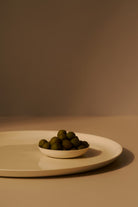PEBBLE BOWL SMALL in Citrus by Mud Australia