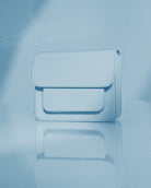 CAYMAN POCKET GLOSSY STRUCTURE BAG in Antique Blue by HVISK