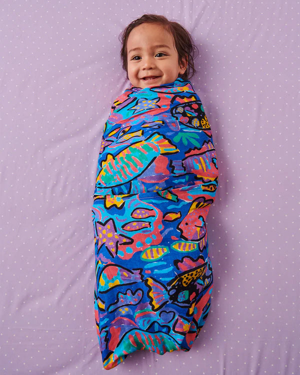 KIP & CO X KEN DONE SWADDLE in| Tropical Fish from the amazing range of Kip & Co 