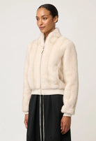 CHRYSTA FAUX FUR BOMBER in Porcelain from Oncewas