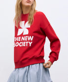 WOMANS SWEATSHIRT in Tulip Red by The New Society