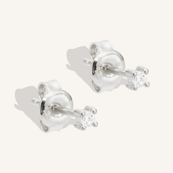 PURE LIGHT STUD EARRINGS in Silver from By Charlotte