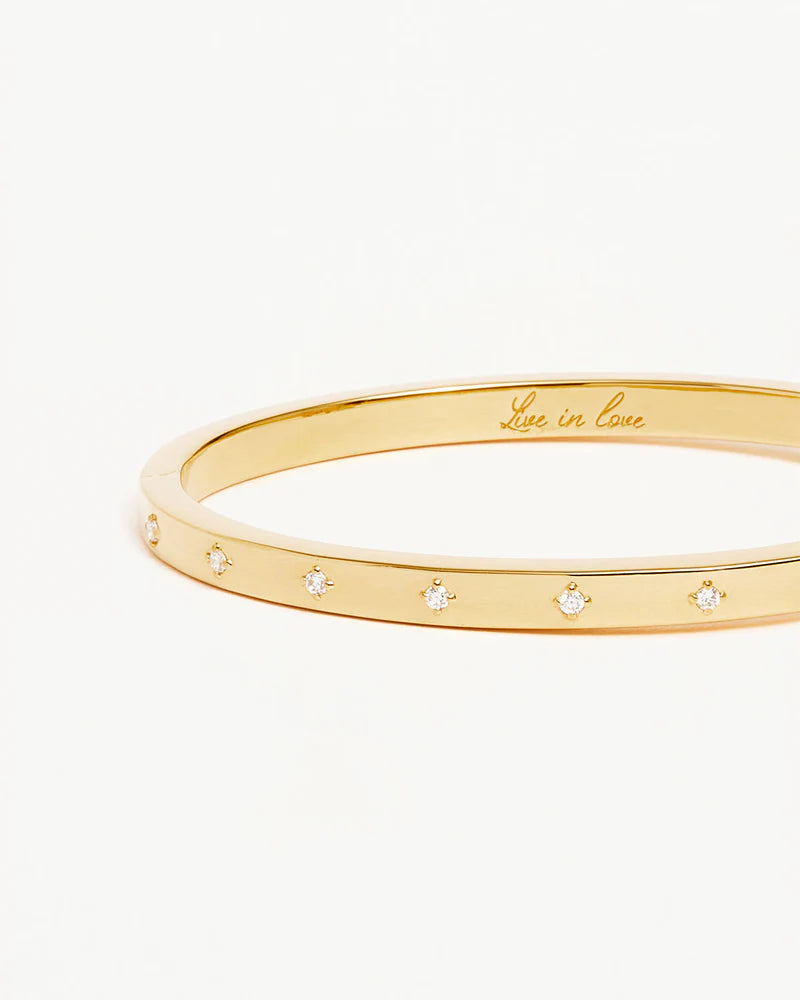 LIVE IN LOVE HINGED BRACELET in Gold from By Charlotte