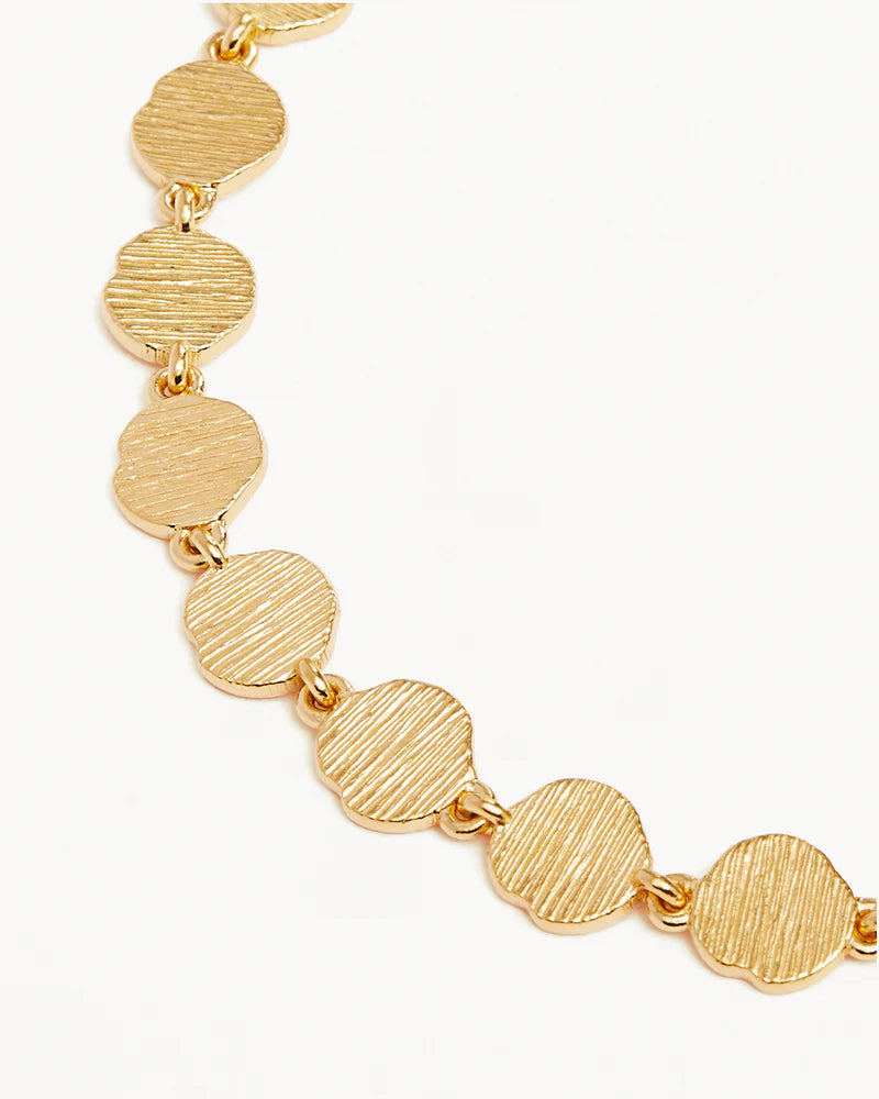 WOVEN LIGHT COIN BRACELET in Gold from By Charlotte