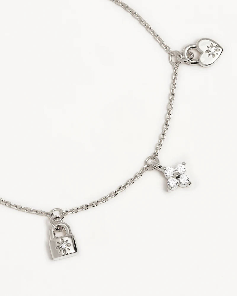 LOVE UNLOCKED CHARM BRACELET in Sterling Silver from By Charlotte