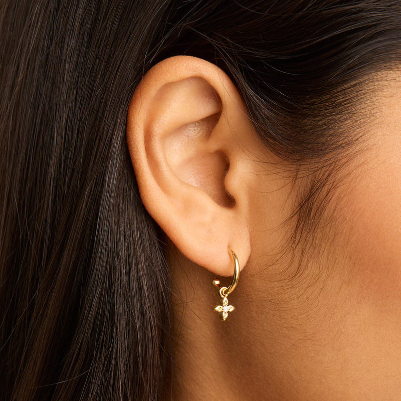 LIVE IN LIGHT LOTUS HOOP EARRING in Gold from By Charlotte