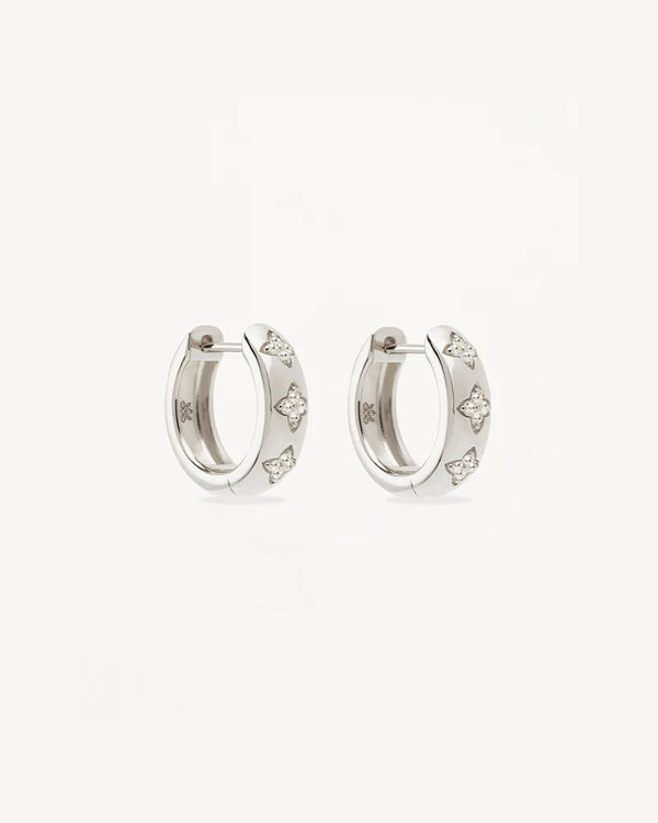 BLOOM WITH YOU LOTUS HOOPS in Sterling Silver from By Charlotte