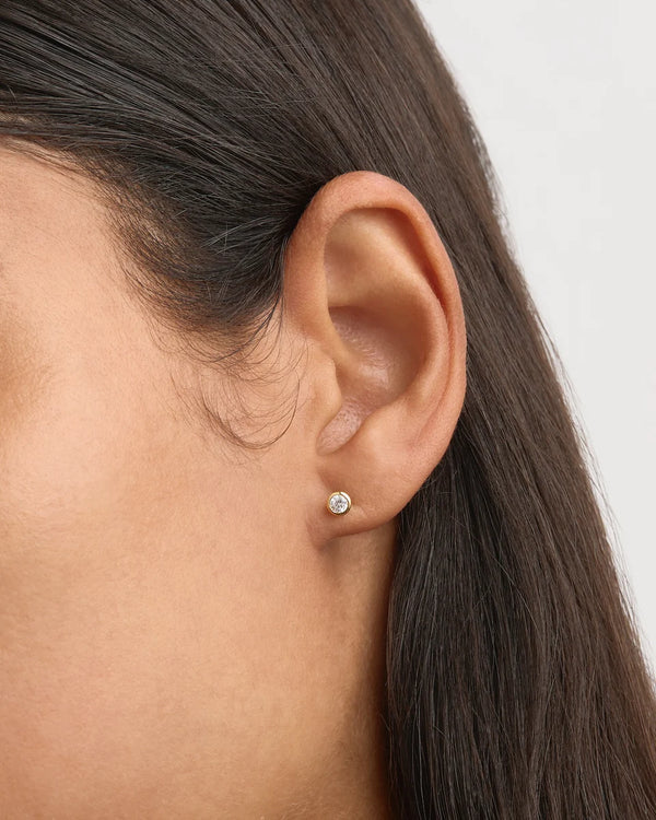 RADIANT CRYSTAL STUD EARRINGS in 18K Gold Vermeil from By Charlotte
