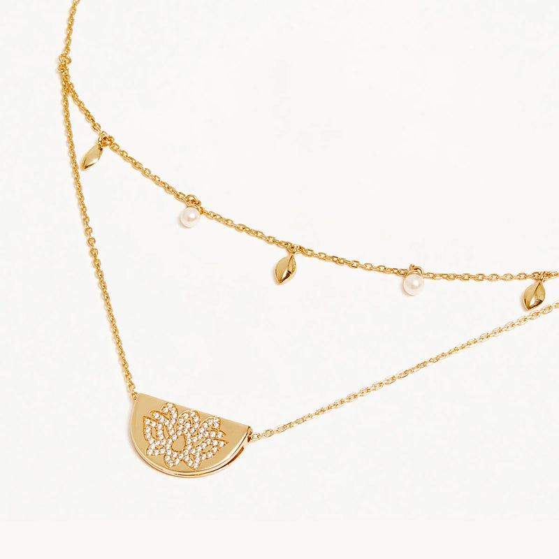 LIVE IN PEACE LOTUS NECKLACE in Gold from By Charlotte
