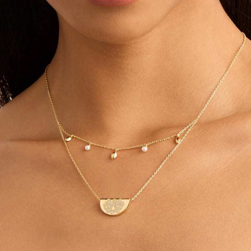 LIVE IN PEACE LOTUS NECKLACE in Gold from By Charlotte