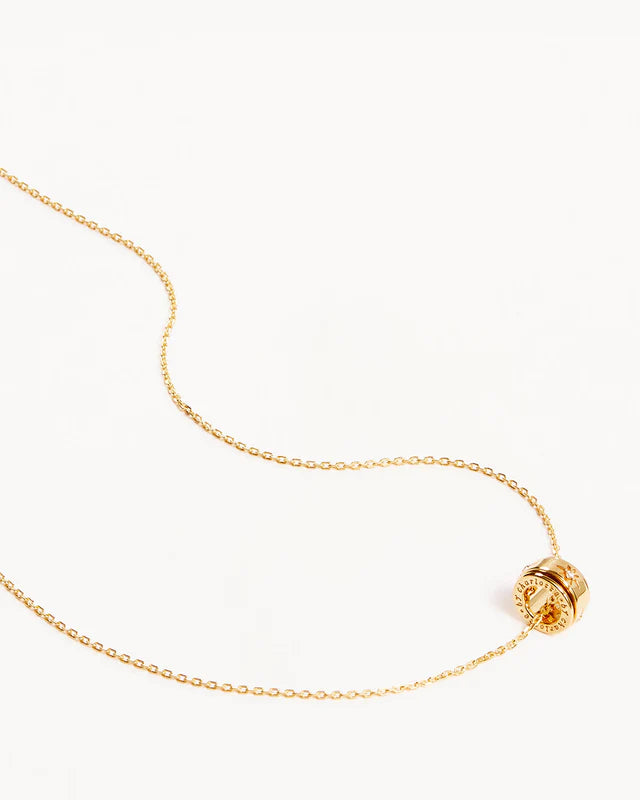 I AM LOVED SPINNING MEDITATION NECKLACE in Gold from By Charlotte