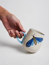 MOTH PARTY MUG in Sky by Jones & Co