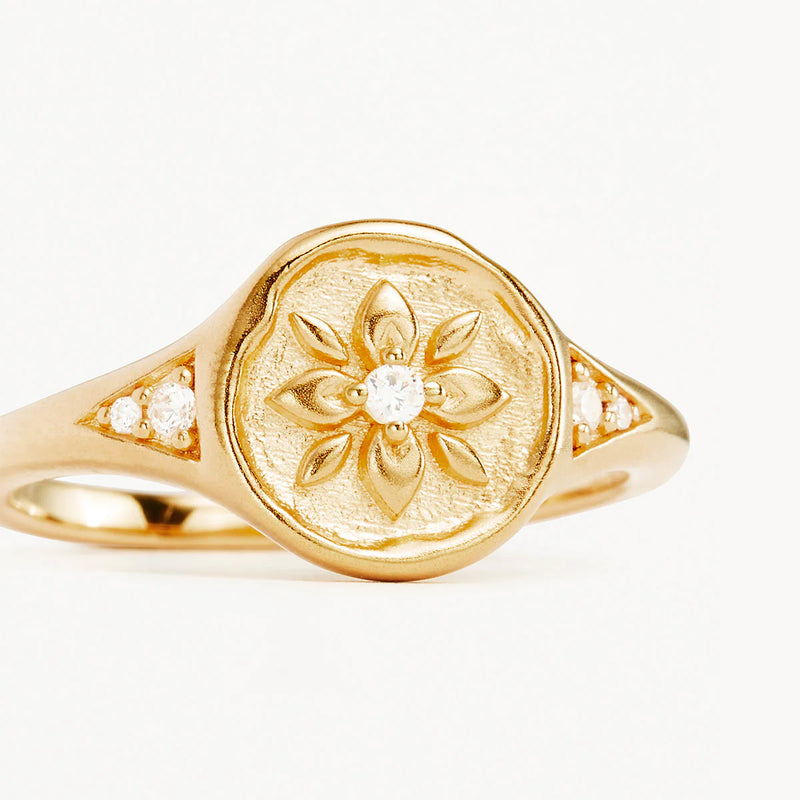 LIVE IN LOVE LOTUS SIGNET RING in Gold from By Charlotte