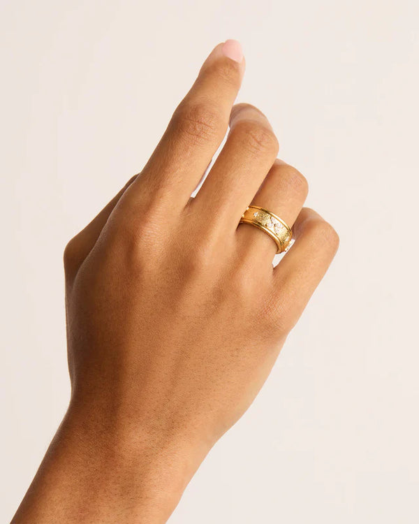 NO FLOWERS SPINNING MEDITATION RING in Gold from By Charlotte