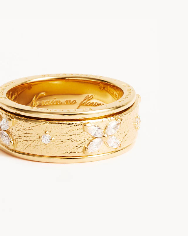 NO FLOWERS SPINNING MEDITATION RING in Gold from By Charlotte