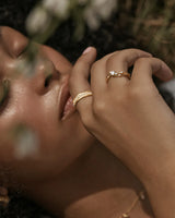 BEGIN AGAIN BAND RING from By Charlotte